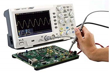 Oscilloscope. An electronic test instrument which graphically displays varying signal voltages as a function of time.
